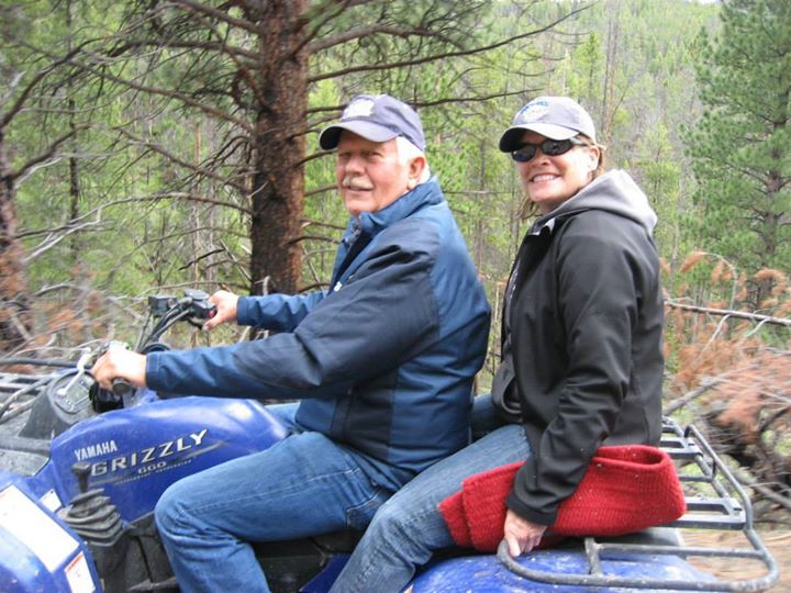 Photo of couple on a Yamaha Grizzly four wheeler