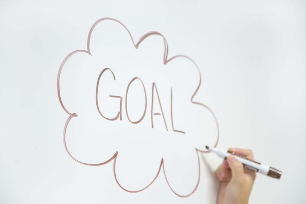 The word "Goal" written on a whiteboard