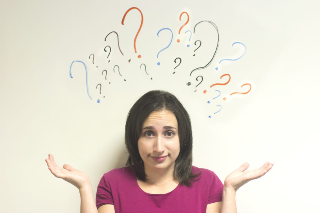 Confused woman with questions